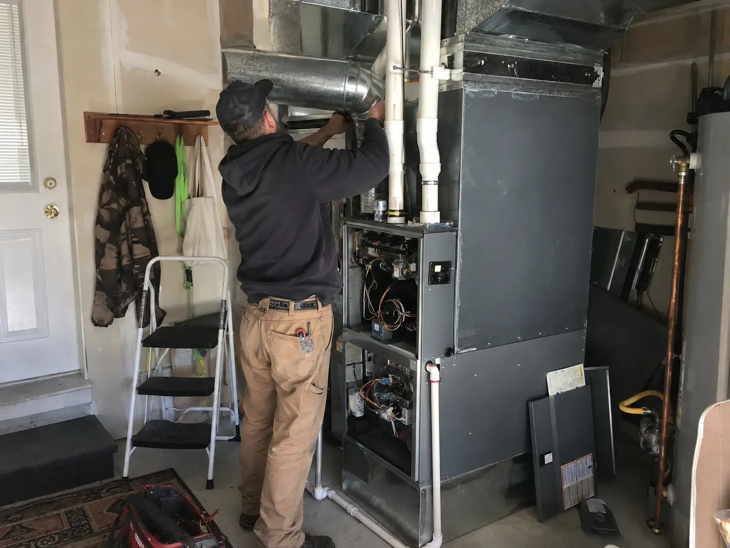 Illustrative high-efficiency residential furnace venting inspection